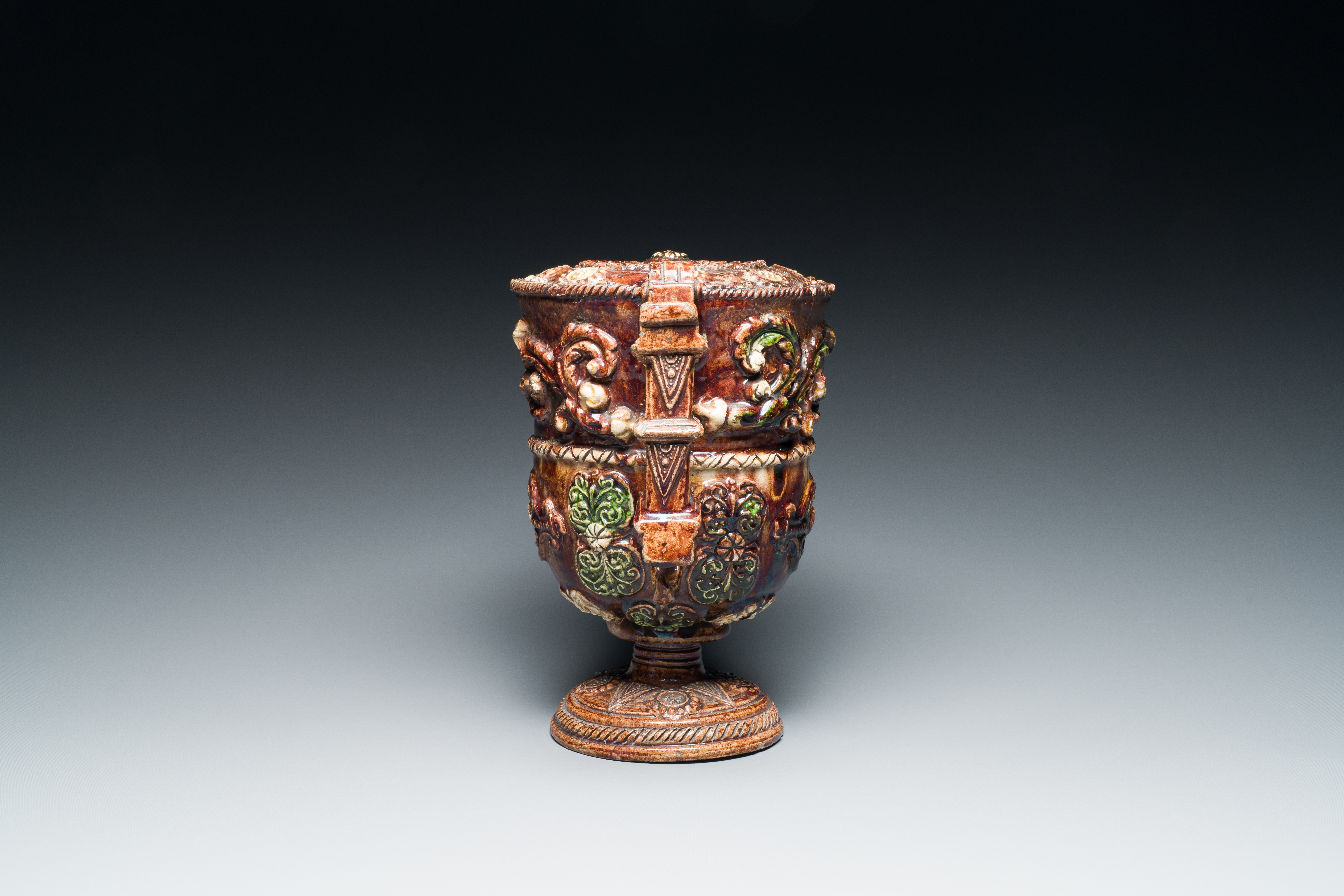 A French polychrome lead-glazed earthenware puzzle jug, Saintonge, 1st half 17th C. - Image 13 of 19
