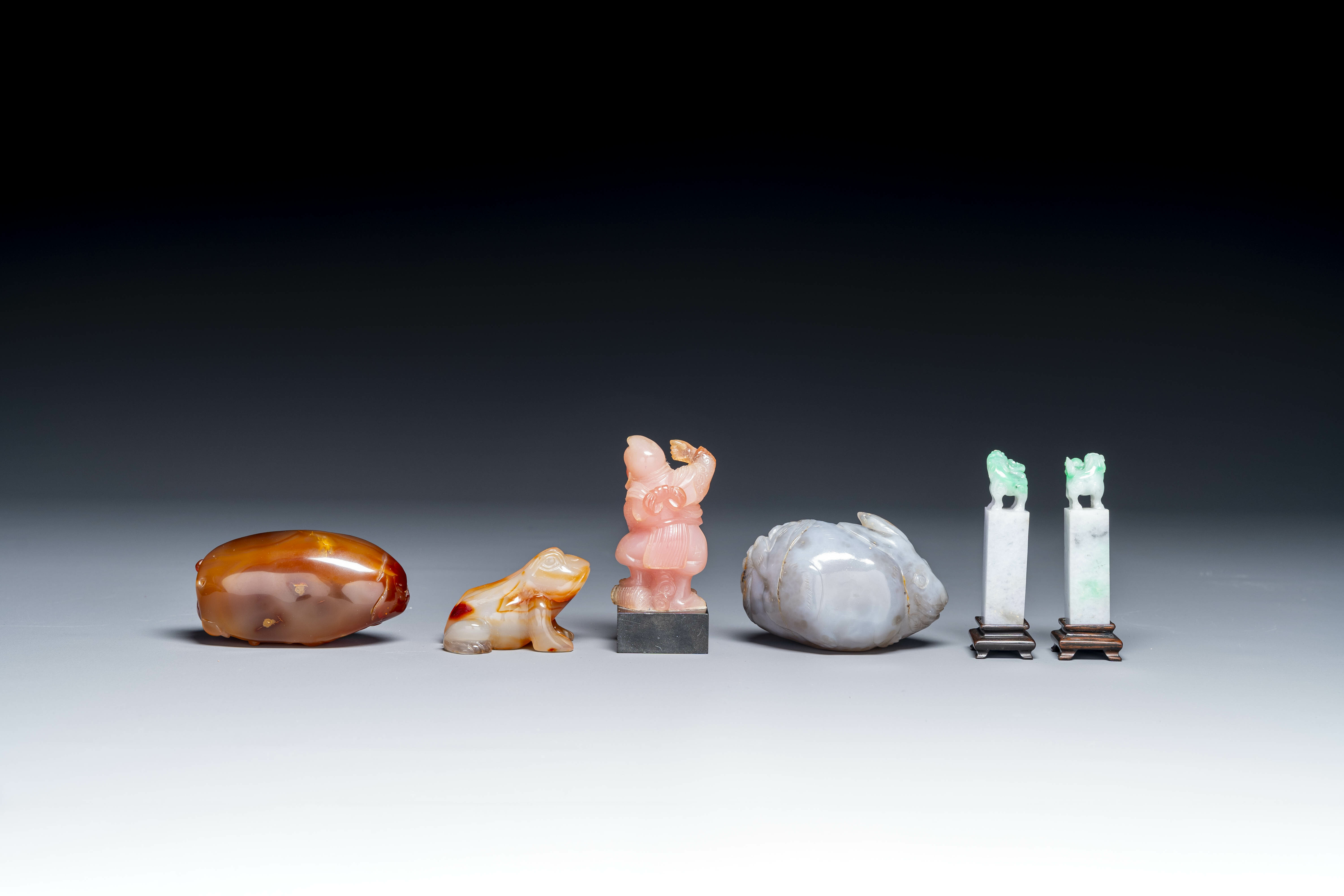 A group of Chinese carvings in lapis lazuli, pink quartz and other precious stones, with several sta - Image 6 of 8