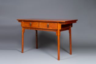 A Chinese huanghuali wooden two-drawer recessed-leg table, 19/20th C.