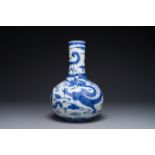 A Chinese blue and white 'dragon' bottle vase, Yongzheng mark, 19th C.