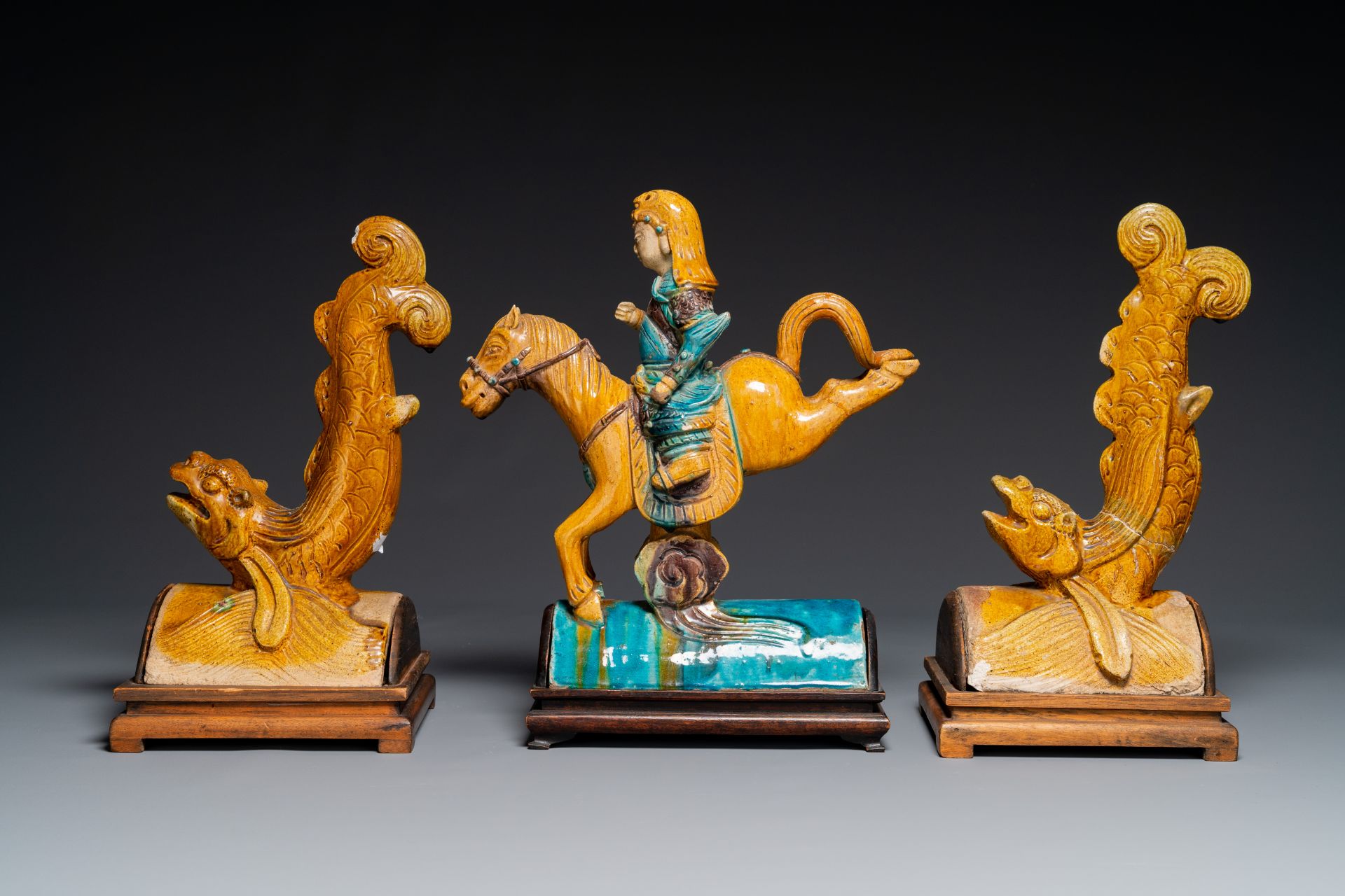 A pair of Chinese sancai roof tiles in the shape of a fish and a warrior on horseback, Ming - Image 2 of 6