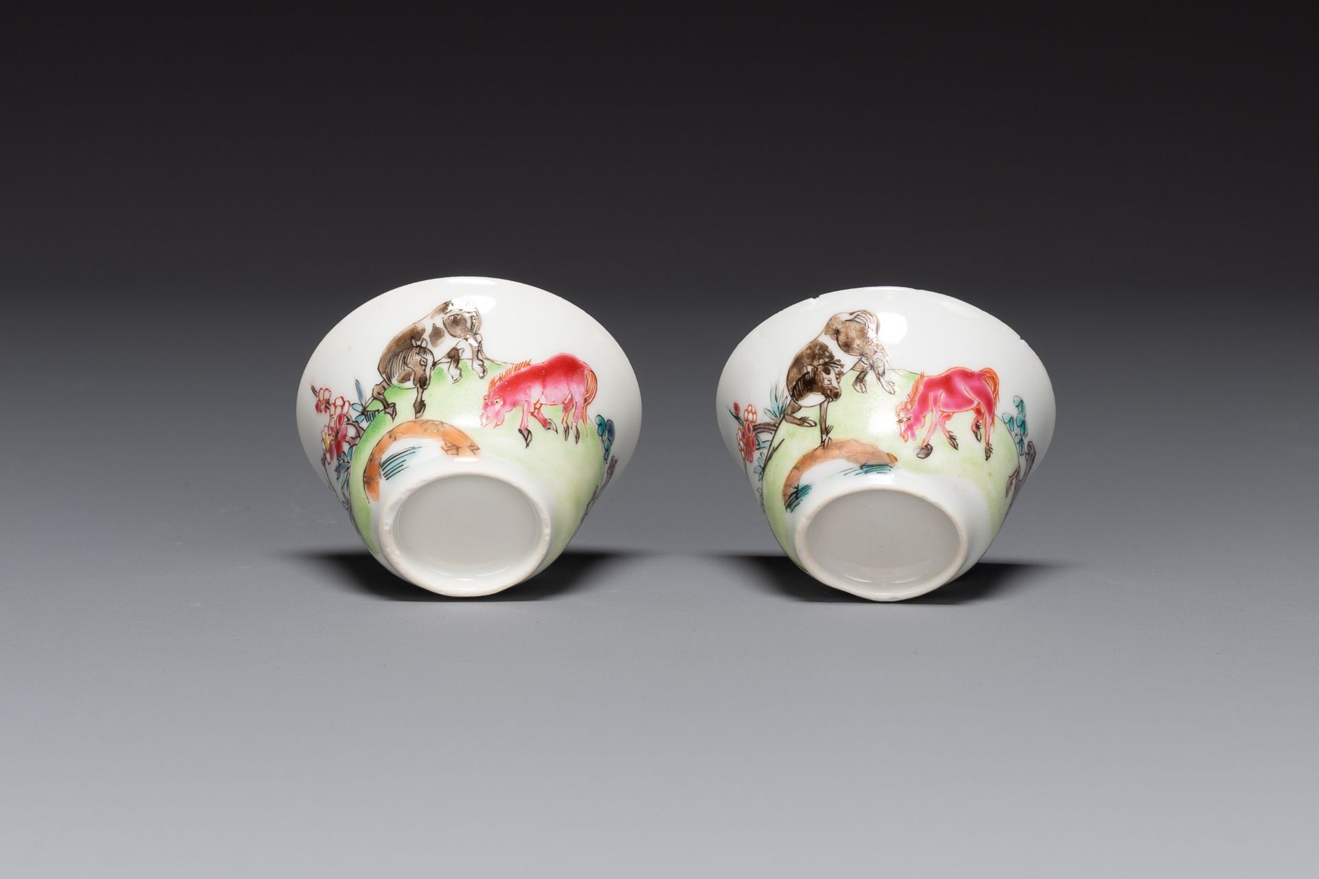 A pair of Chinese famille rose cups and saucers with horses, Yongzheng - Image 4 of 4