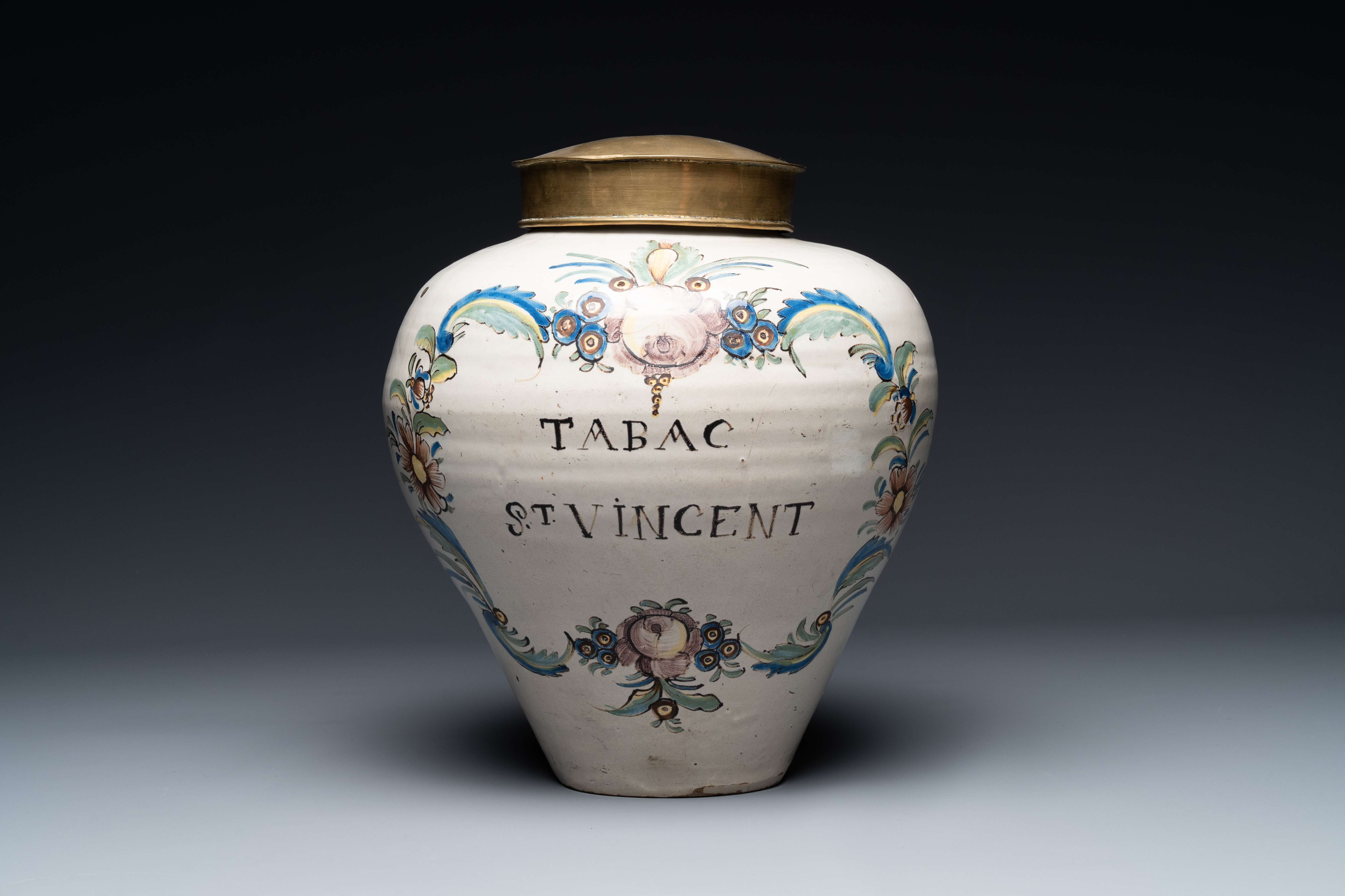 A polychrome pottery 'St. Vincent' tobacco jar, France, 18th century - Image 3 of 19