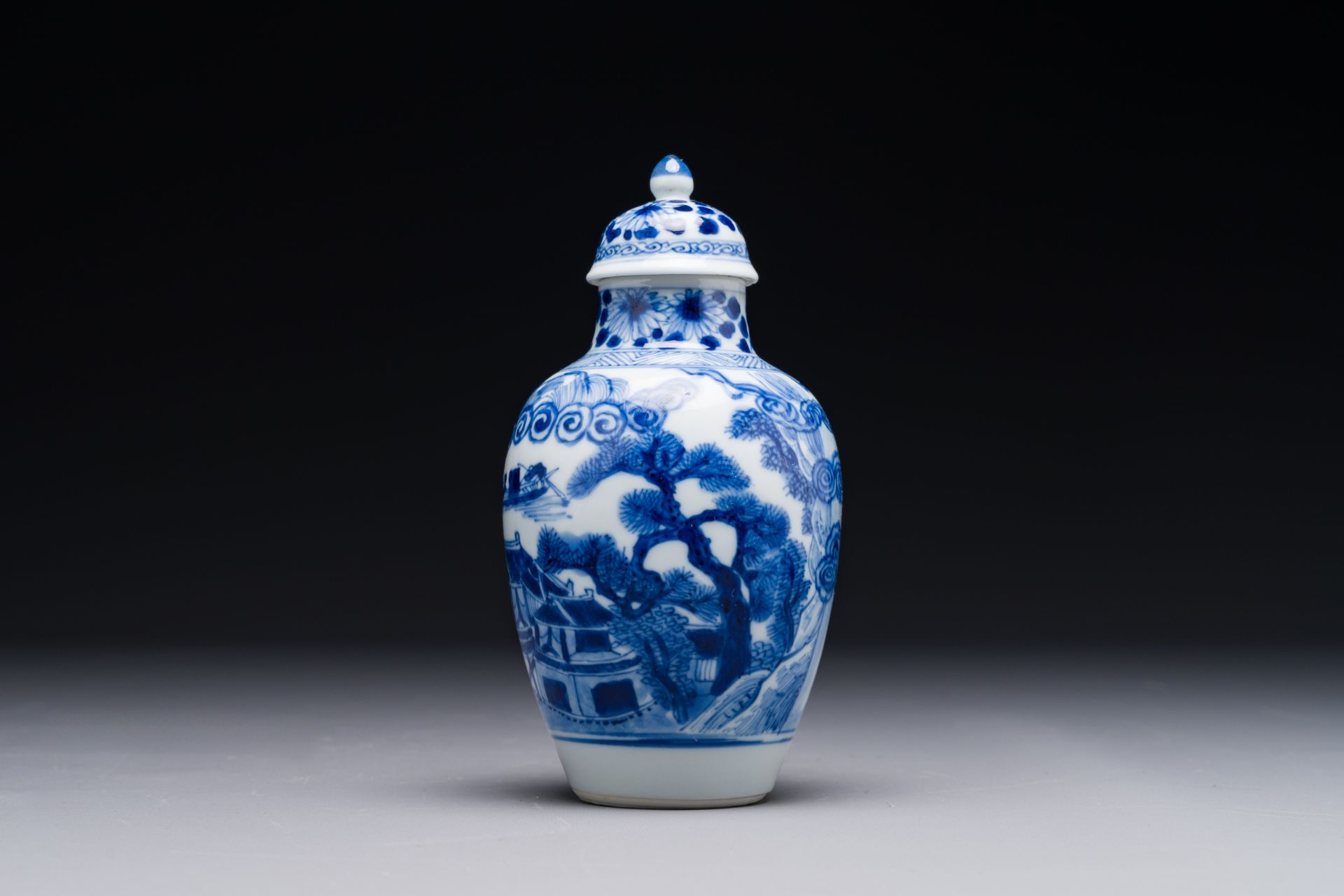 A Chinese blue and white covered vase with fishermen in a river landscape, jade mark, Kangxi - Image 2 of 7