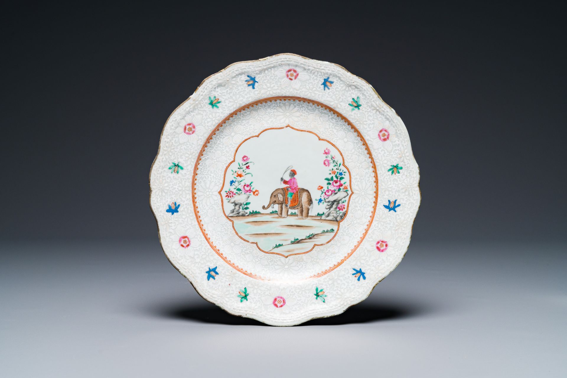 A Chinese famille rose 'elephant and rider' plate for the Indian market, Qianlong