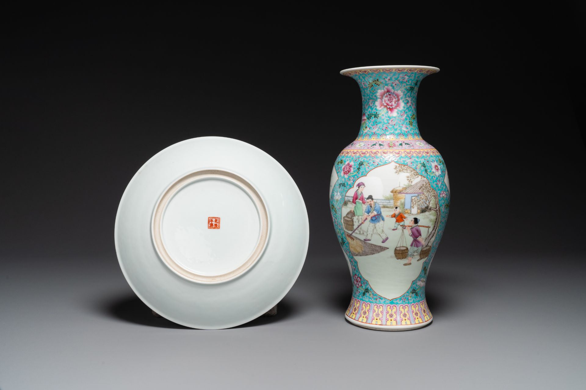 A Chinese famille rose dish with figural design and a 'rice production' vase, Qianlong mark, 20th C. - Image 2 of 4