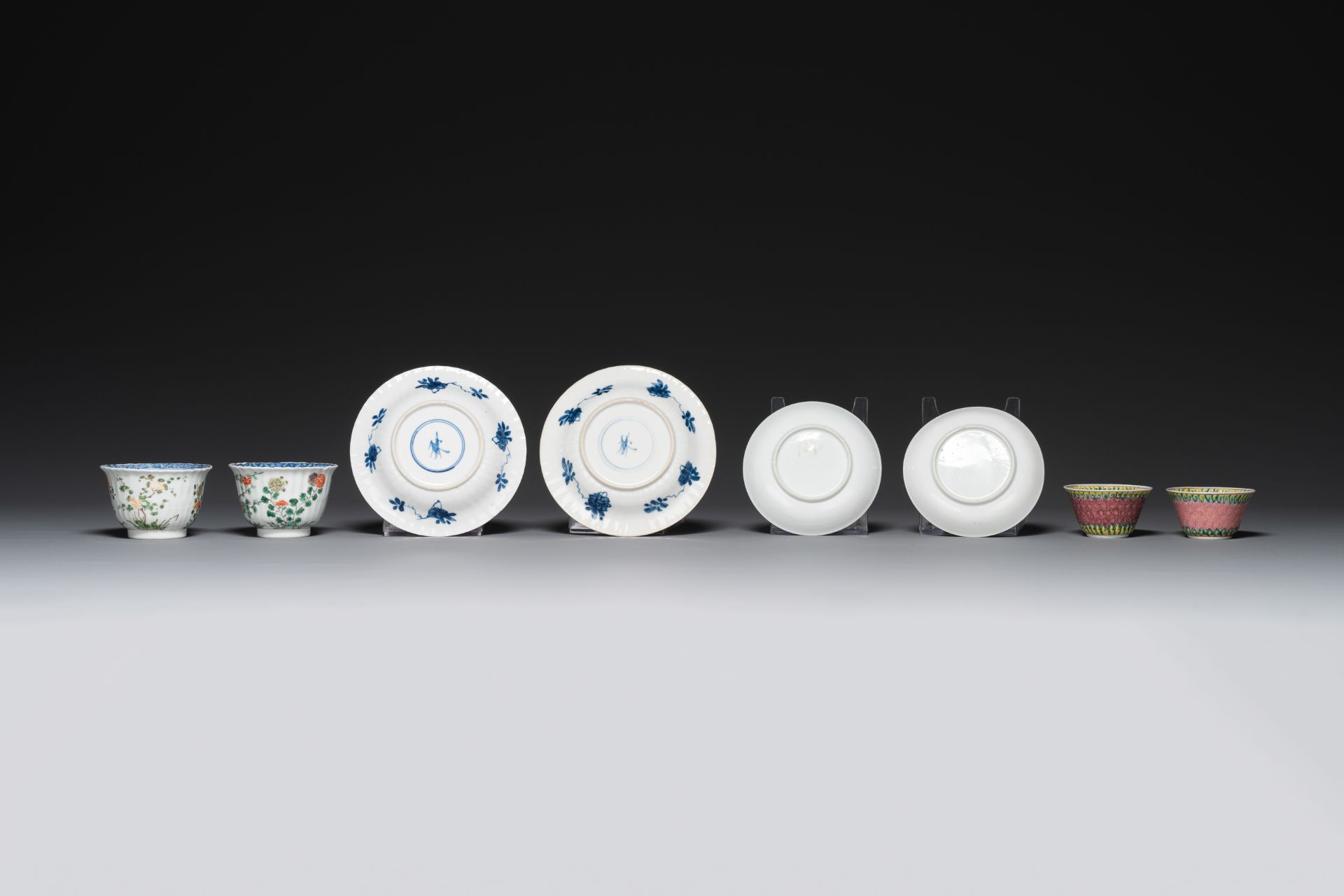 A pair of Chinese famille verte and a pair of famille rose cups and saucers, Kangxi/Yongzheng - Image 3 of 5