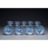 Five Chinese blue and white cups and four saucers with boys carrying a vase, Kangxi mark, Guangxu