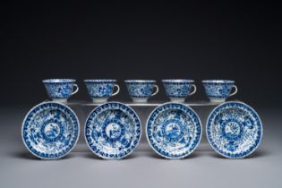 Five Chinese blue and white cups and four saucers with boys carrying a vase, Kangxi mark, Guangxu