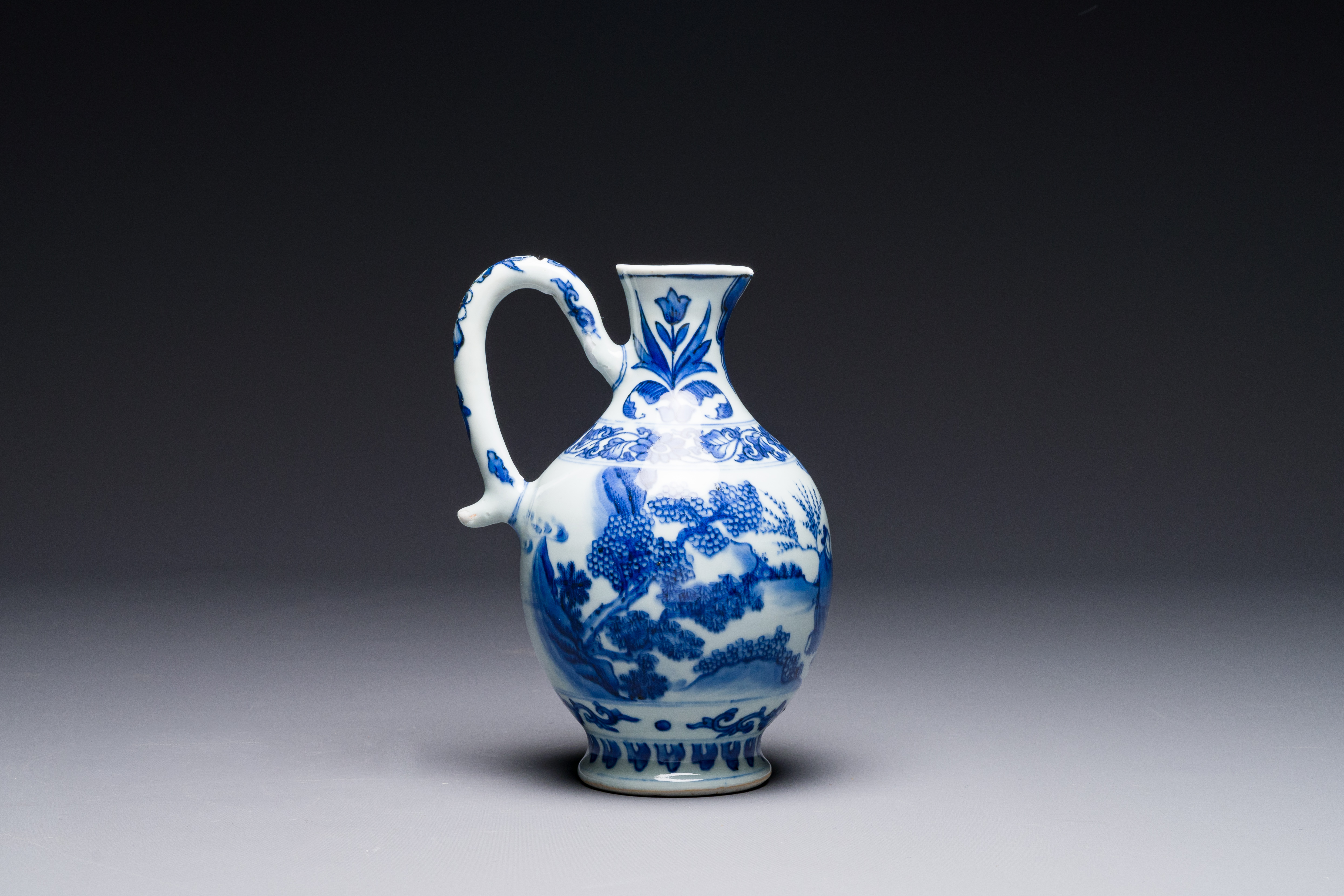 A Chinese blue and white ewer with figures in a landscape, Transitional period - Image 3 of 6