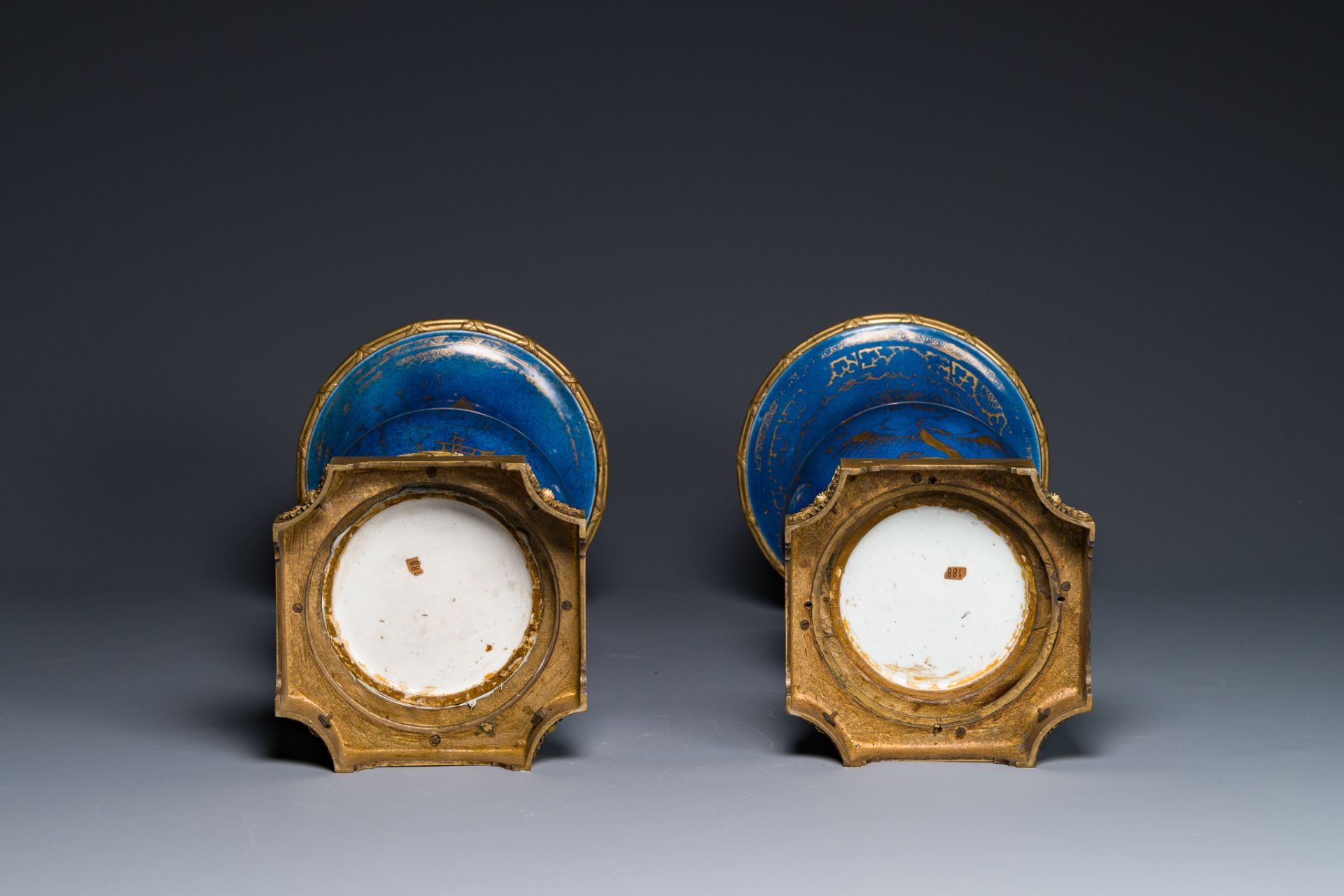 A pair of Chinese gilt-decorated powder-blue 'yenyen' vases with gilt bronze mounts, Kangxi - Image 6 of 6
