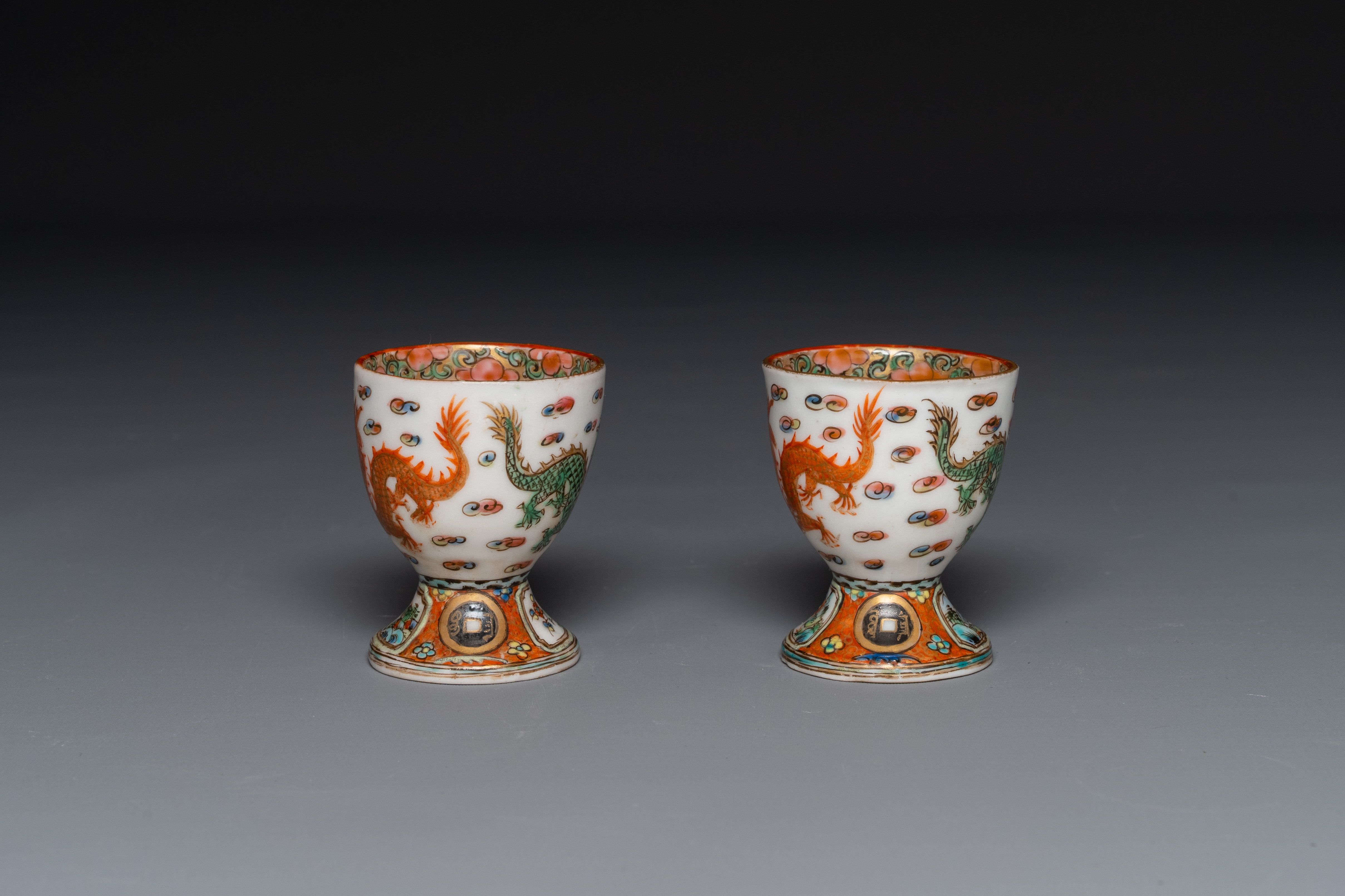 Three Chinese Canton famille rose armorial plates and a pair of egg cups for the Portugese market, G - Image 3 of 5