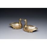 A pair of Chinese silver-inlaid bronze duck-form water droppers, Qing