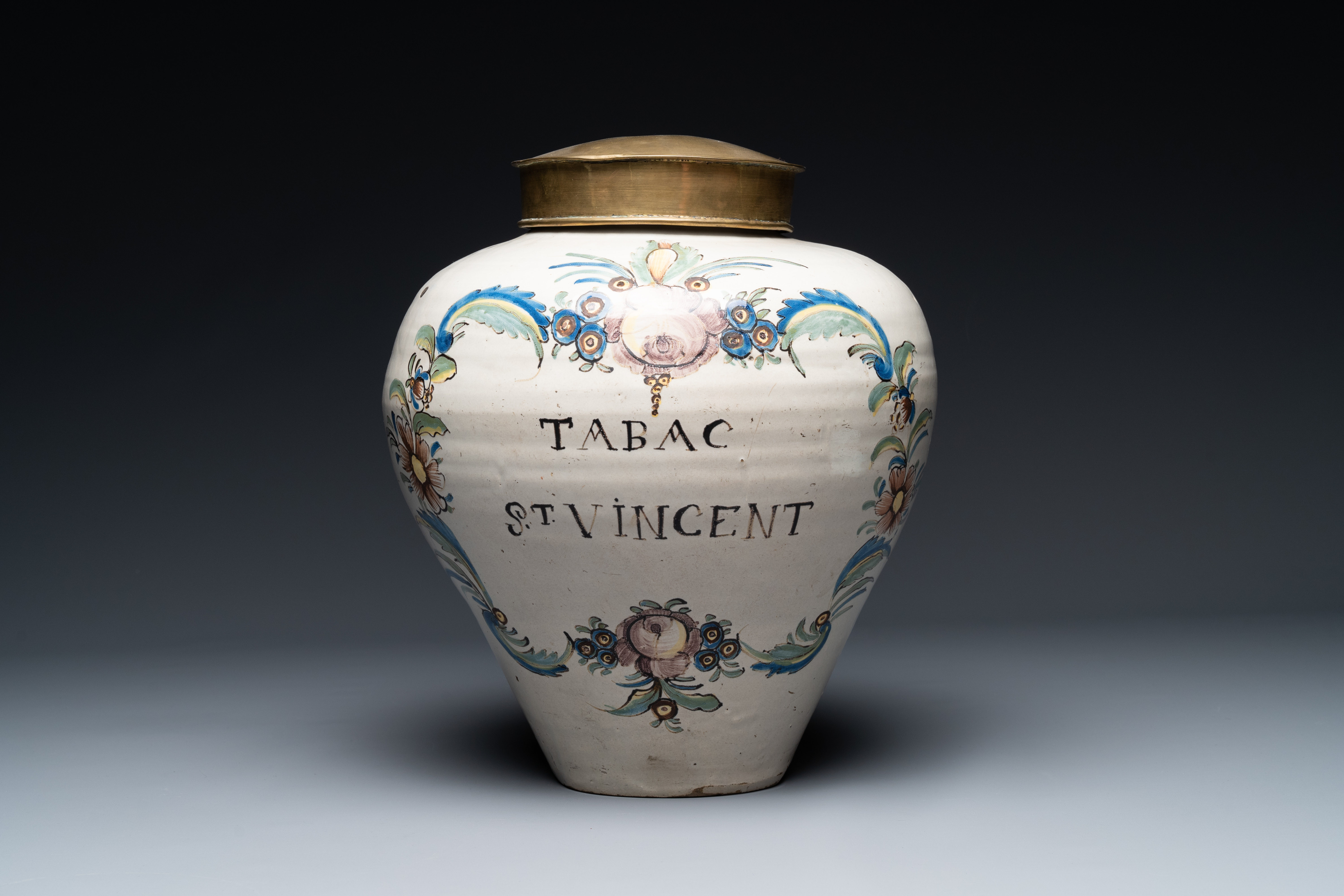 A polychrome pottery 'St. Vincent' tobacco jar, France, 18th century - Image 2 of 19
