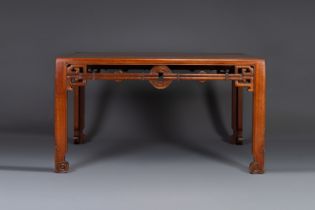 A large rectangular Chinese huanghuali wooden table, 19/20th C.