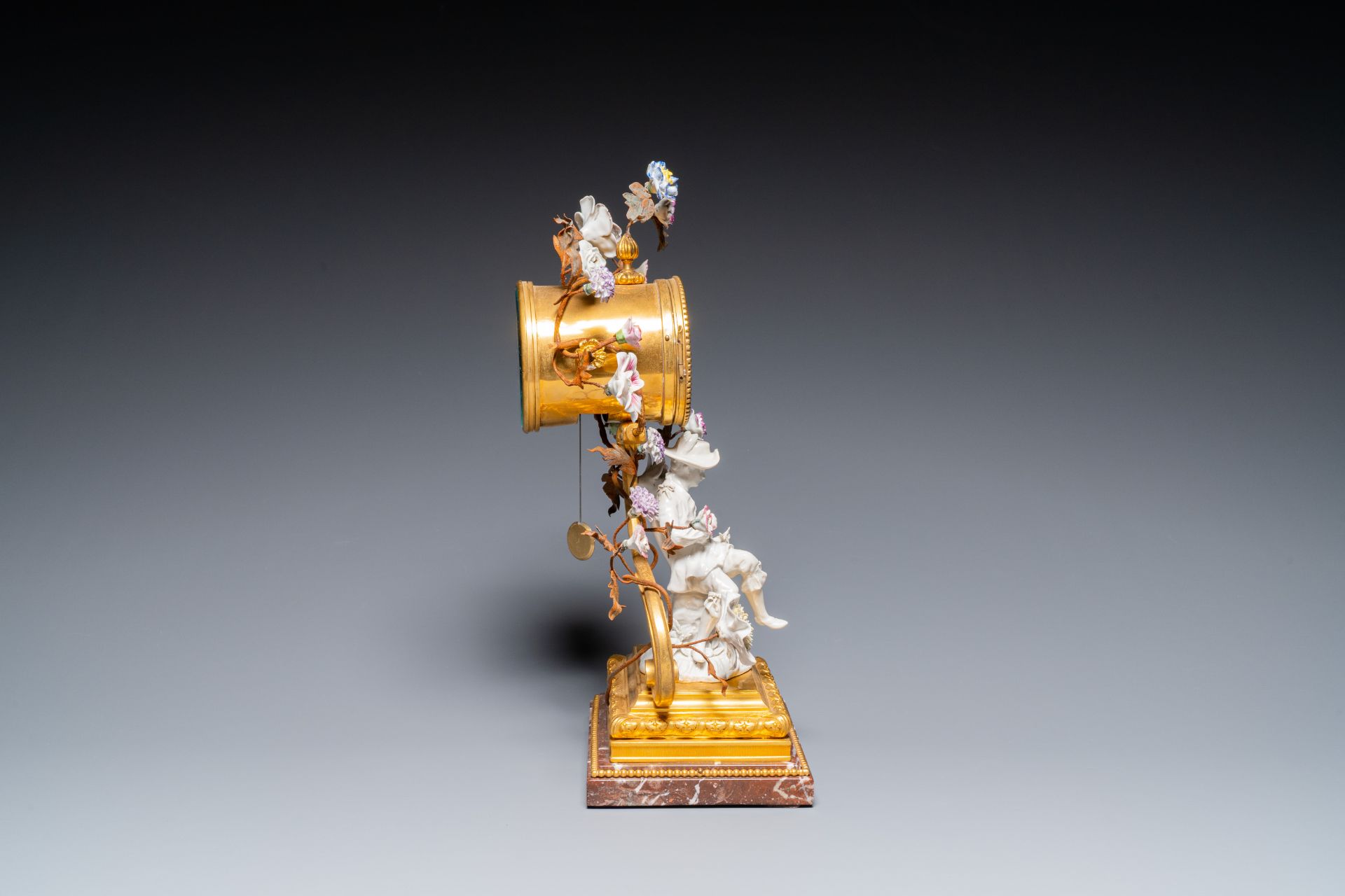 A French ormolu-mounted porcelain mantel clock, 18/19th C. - Image 7 of 28