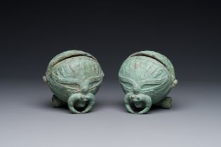 A pair of round bronze bells for water buffalo, Cambodia, Batambang provence, 300 BC