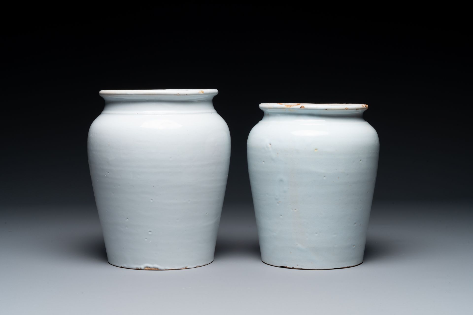 Two white glazed pottery tobacco jars, France, late 18th C.