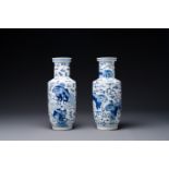 A pair of Chinese blue and white 'Buddhist lion' vases, Kangxi mark, 19th C.