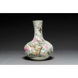 A Chinese famille rose bottle vase with birds among blossom branches, Qianlong mark, Republic