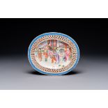 An oval Chinese Canton famille rose dish with a reticulated border, 19th C.