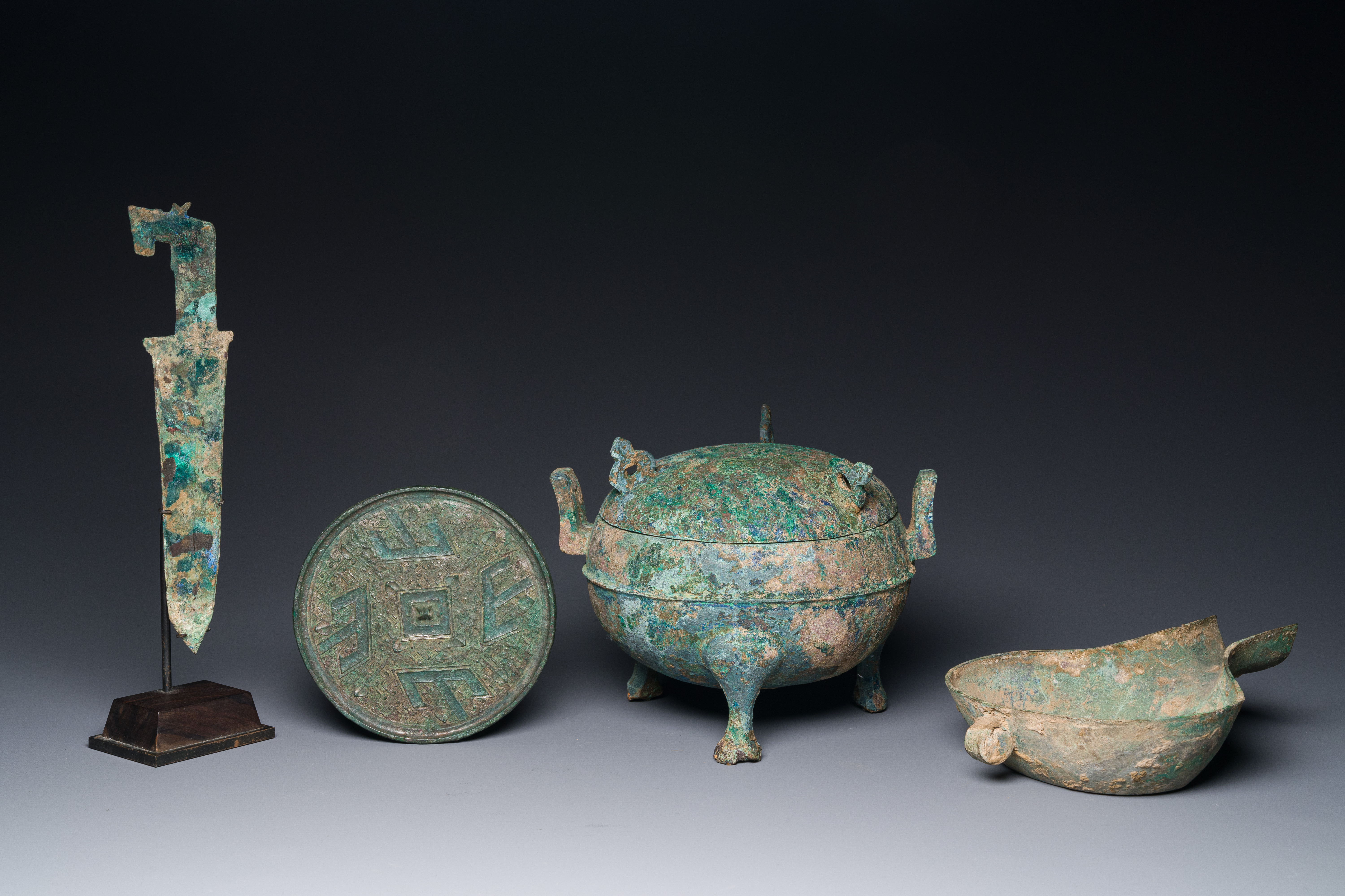 A group of four Chinese archaic bronze wares, late Shang, Warring States and Han - Image 2 of 12