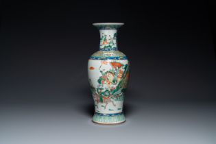 A Chinese famille verte vase with warriors on horseback, 19th C.