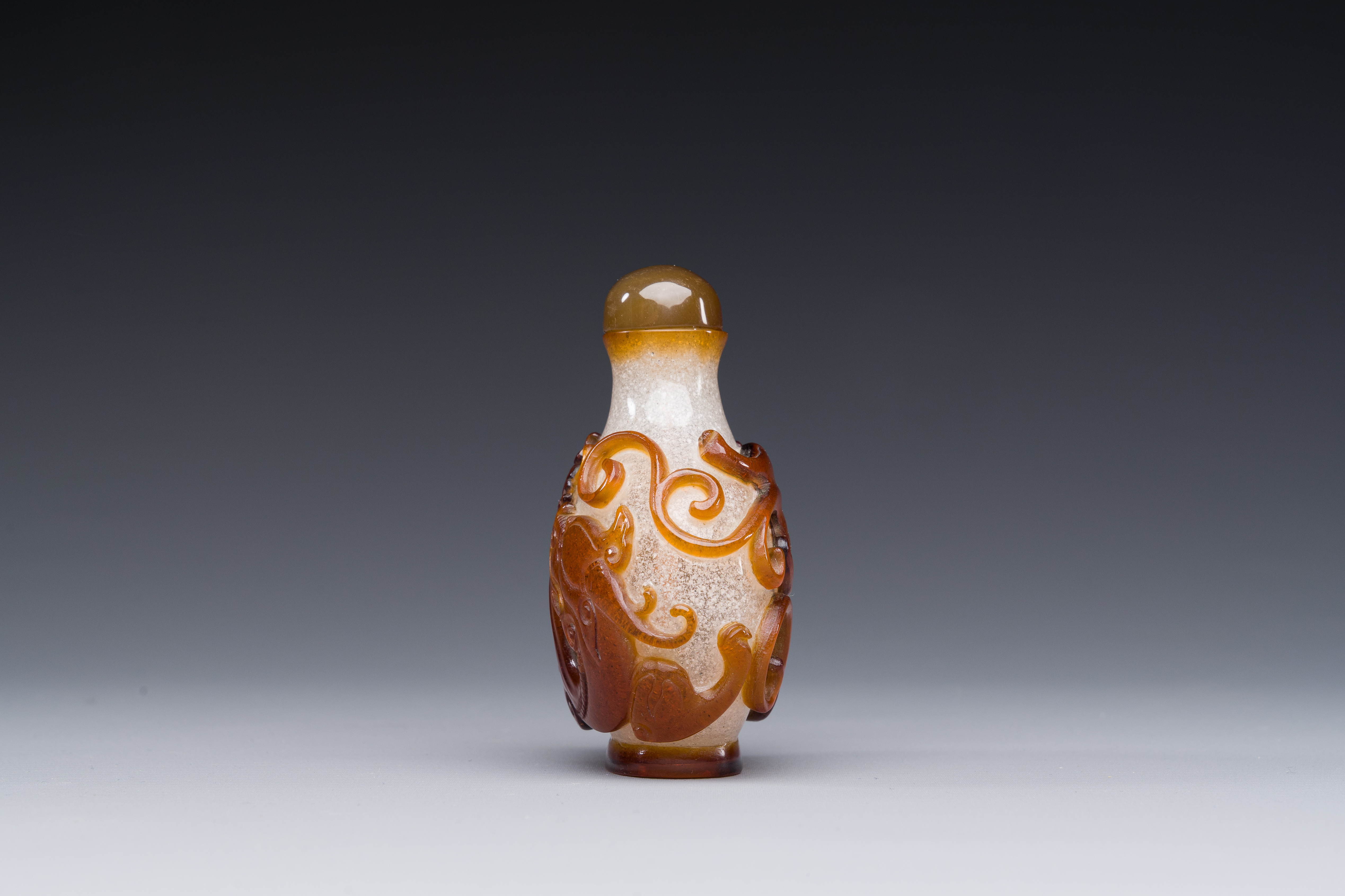 A rare Chinese brown-overlay white glass snuff bottle with chilong design, Qianlong/Jiaqing - Image 2 of 6