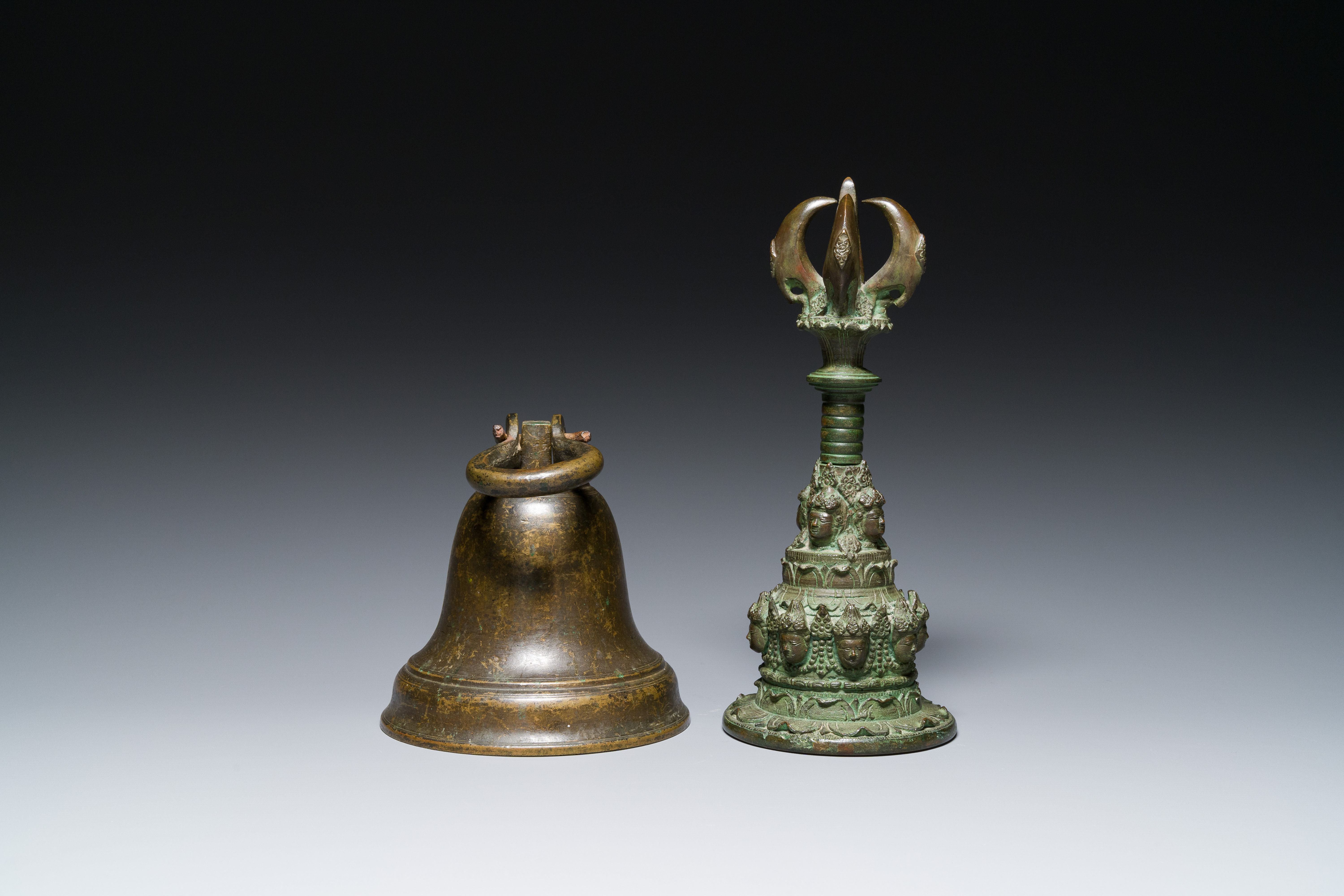 A bronze bell and a ceremonial hand bell, South Asia and Southeast Asia, 19th C. or earlier - Image 11 of 21