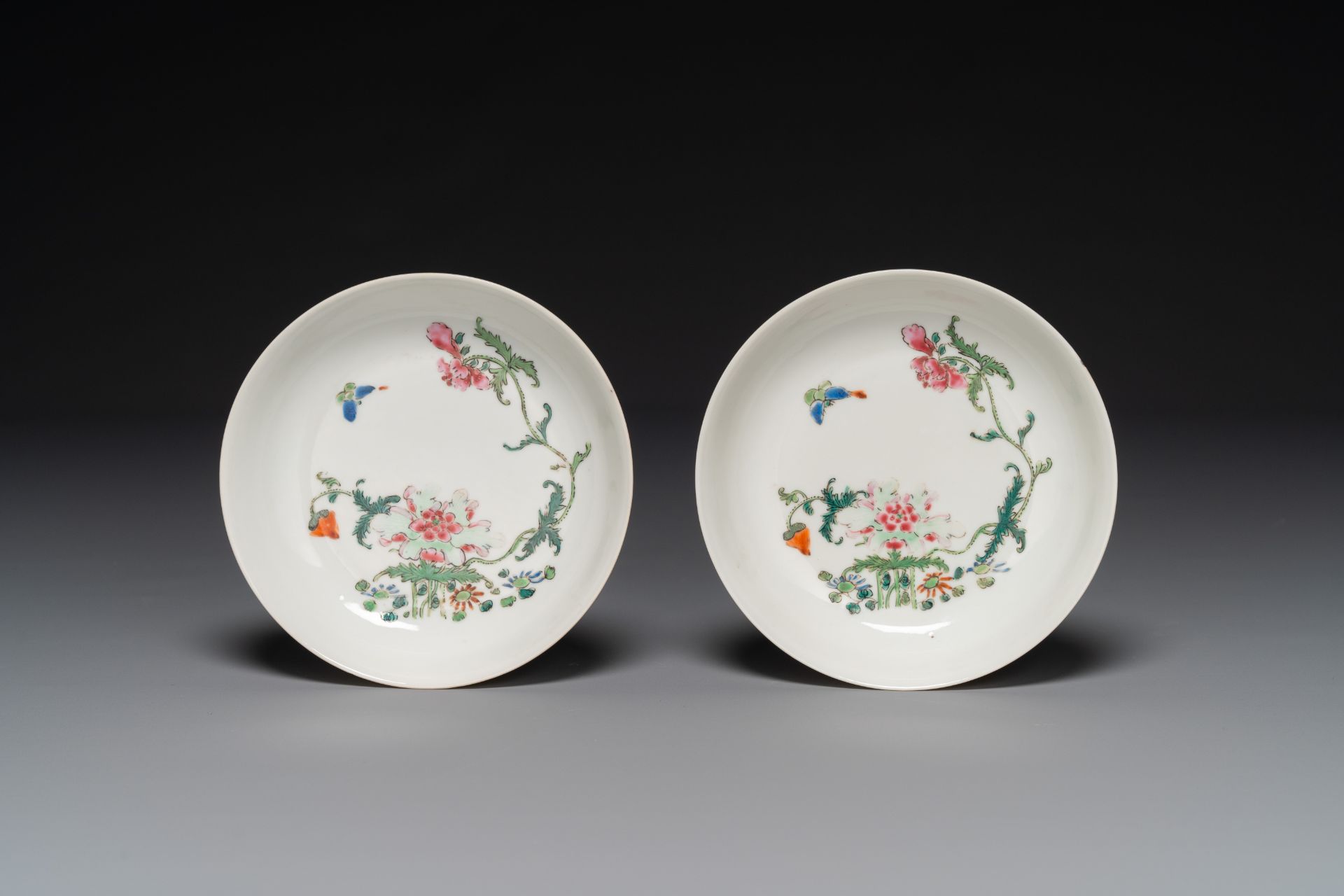 A pair of Chinese famille rose 'peony and butterfly' dishes, Yongzheng/Qianlong