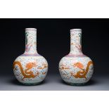 A pair of Chinese famille rose 'dragon' bottle vases, Tongzhi/Guangxu