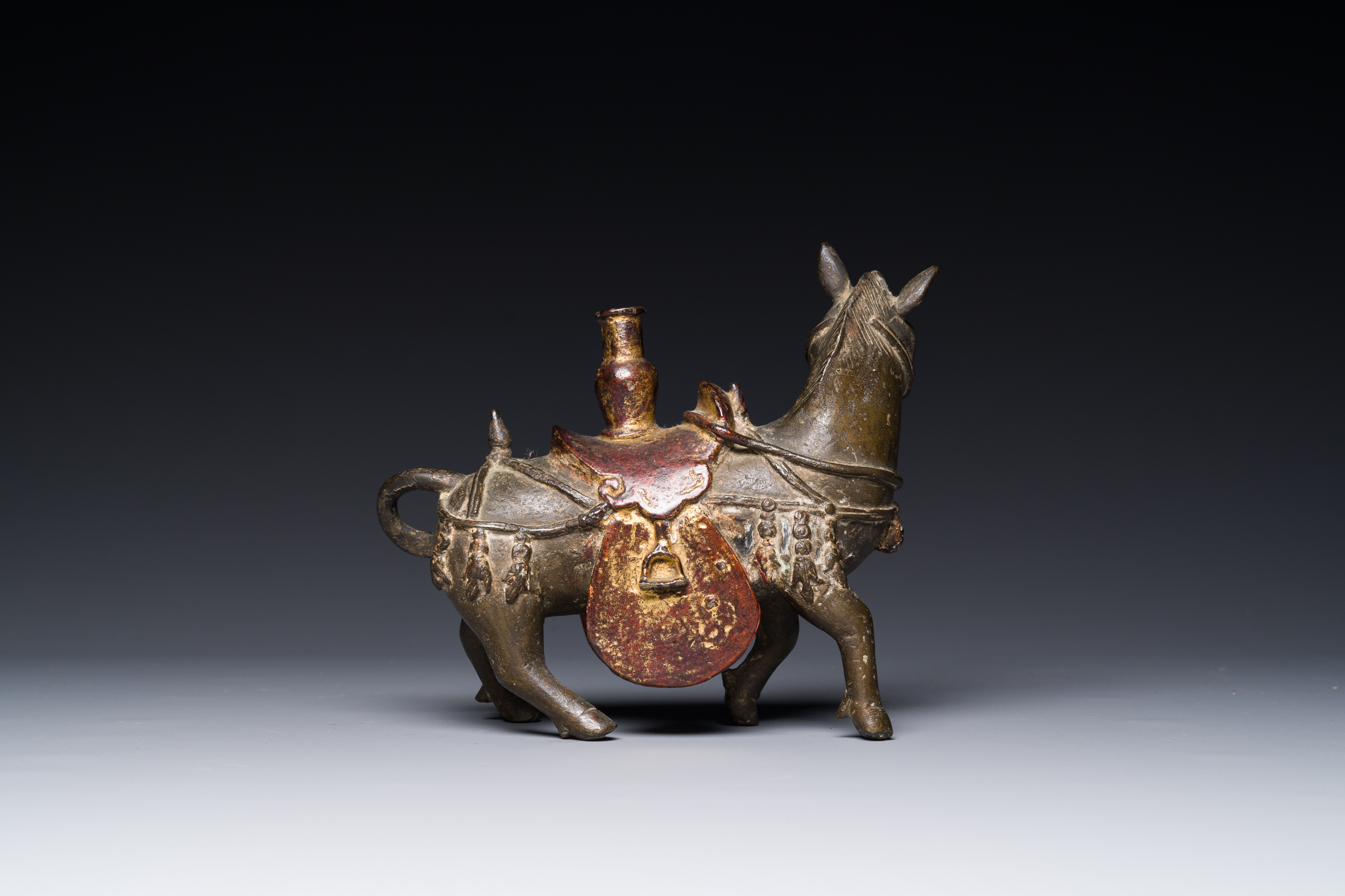 A rare Chinese partly lacquered and gilt bronze incense holder in the shape of a horse, Yuan/early M - Image 4 of 7