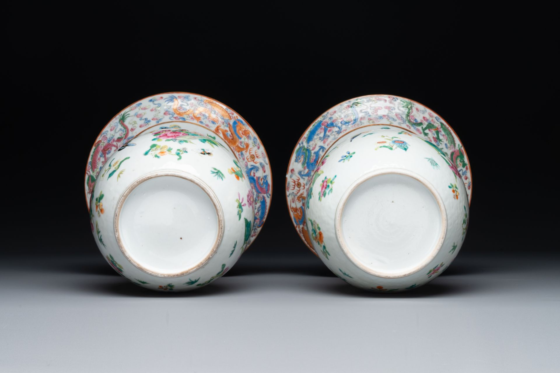 A pair of Chinese Canton famille rose spittoons with dragons, birds, butterflies and flowers, 19th C - Image 6 of 6