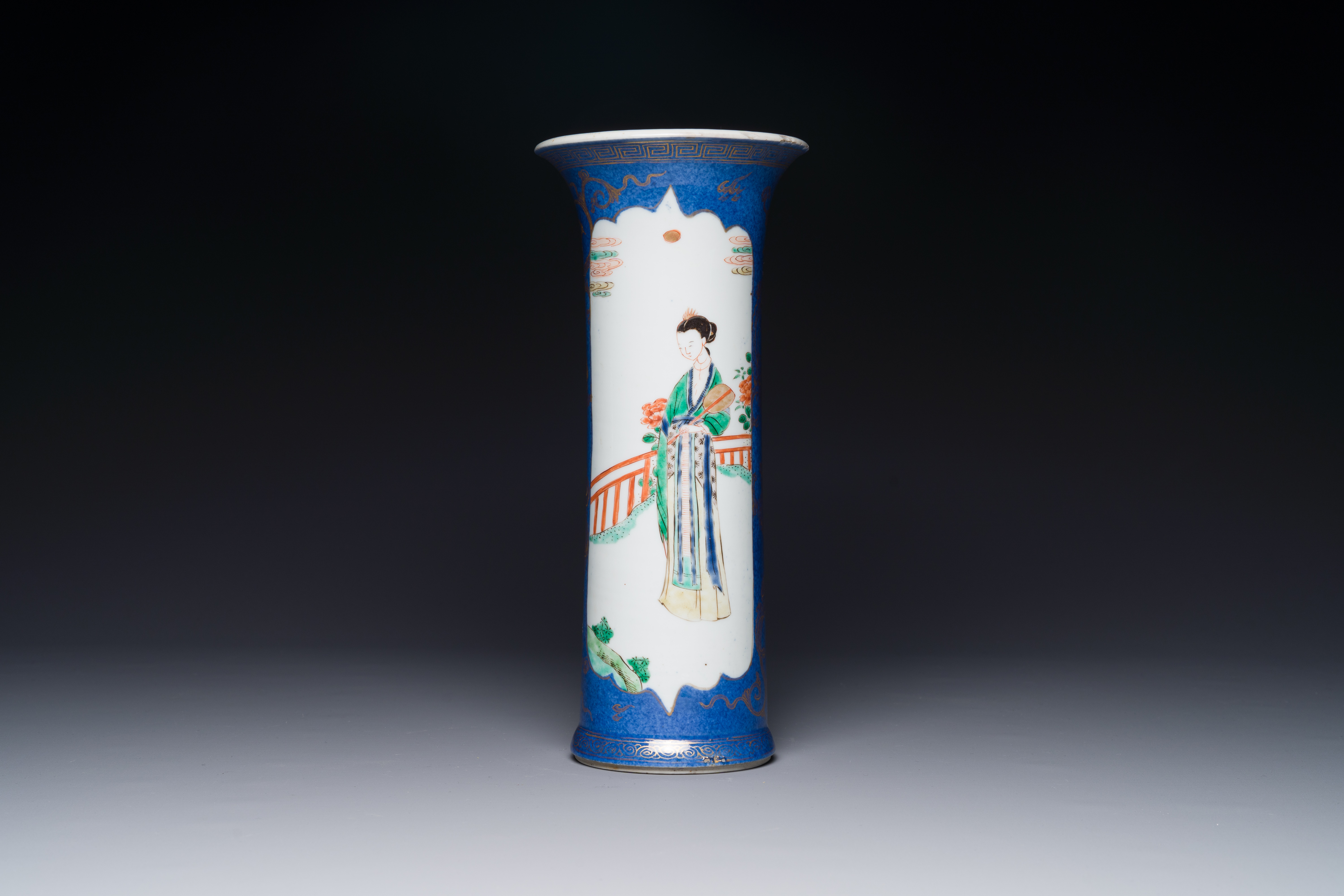 A Chinese famille verte powder-blue-ground 'court lady' beaker vase, Kangxi