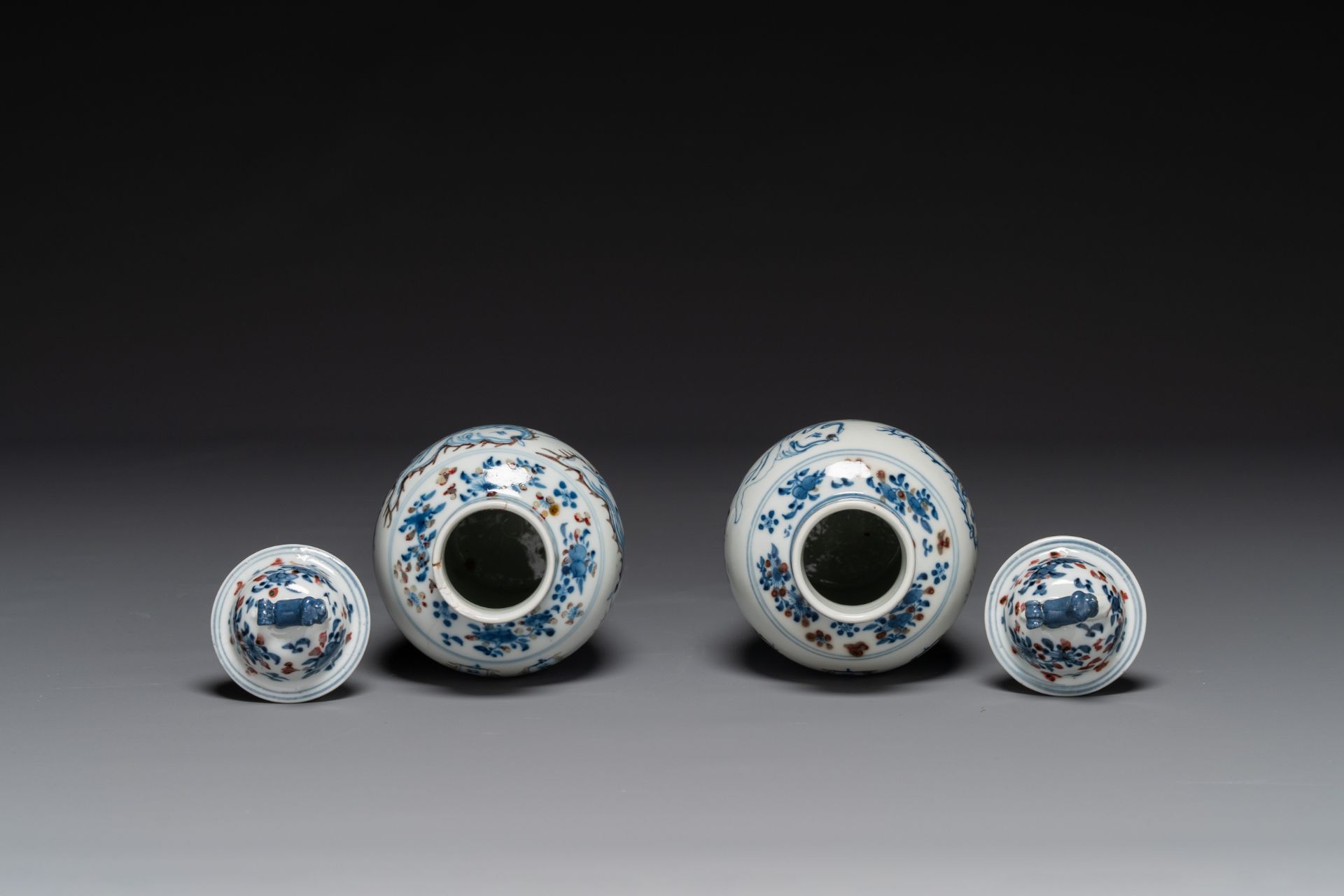 A pair of Chinese blue, white and copper-red vases and covers, Kangxi mark, 19th C. - Image 3 of 4