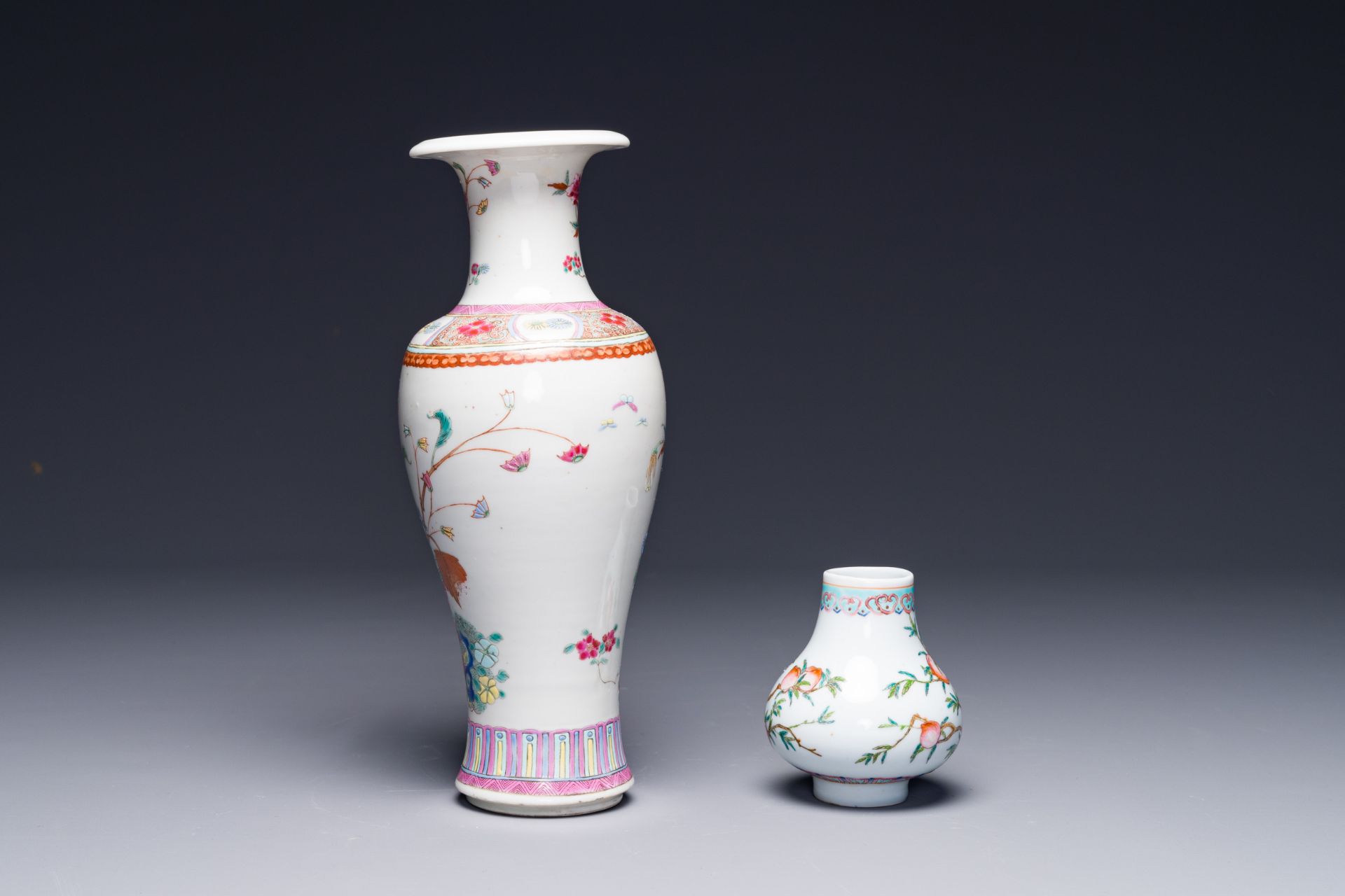 A small Chinese famille rose 'nine peaches' vase and an 'antiquities' vase, 19th C. - Image 2 of 3