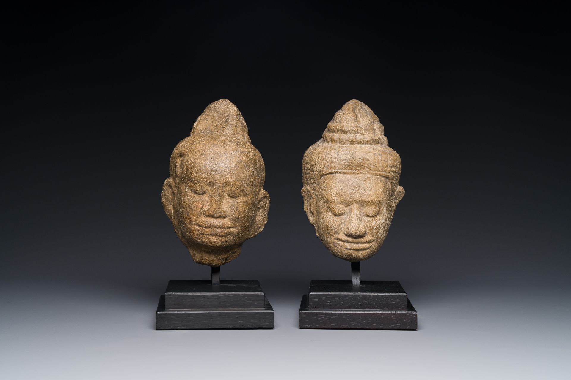 A stone head of Buddha and a sandstone khmer head of a deity, Bayon style, Cambodia, 12/13th C. - Image 5 of 12