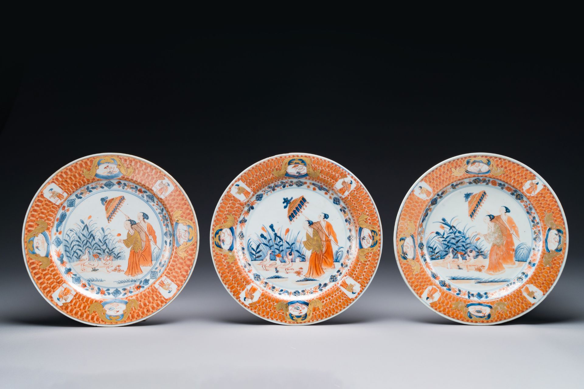 Three Chinese Imari-style plates with 'Parasol ladies' after Cornelis Pronk, Qianlong