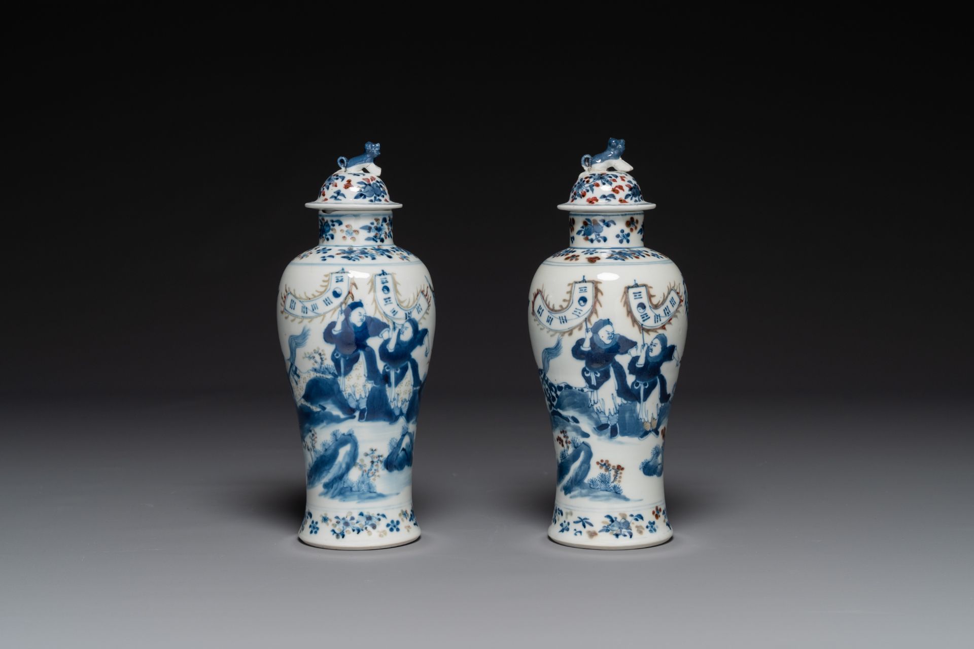 A pair of Chinese blue, white and copper-red vases and covers, Kangxi mark, 19th C. - Image 2 of 4