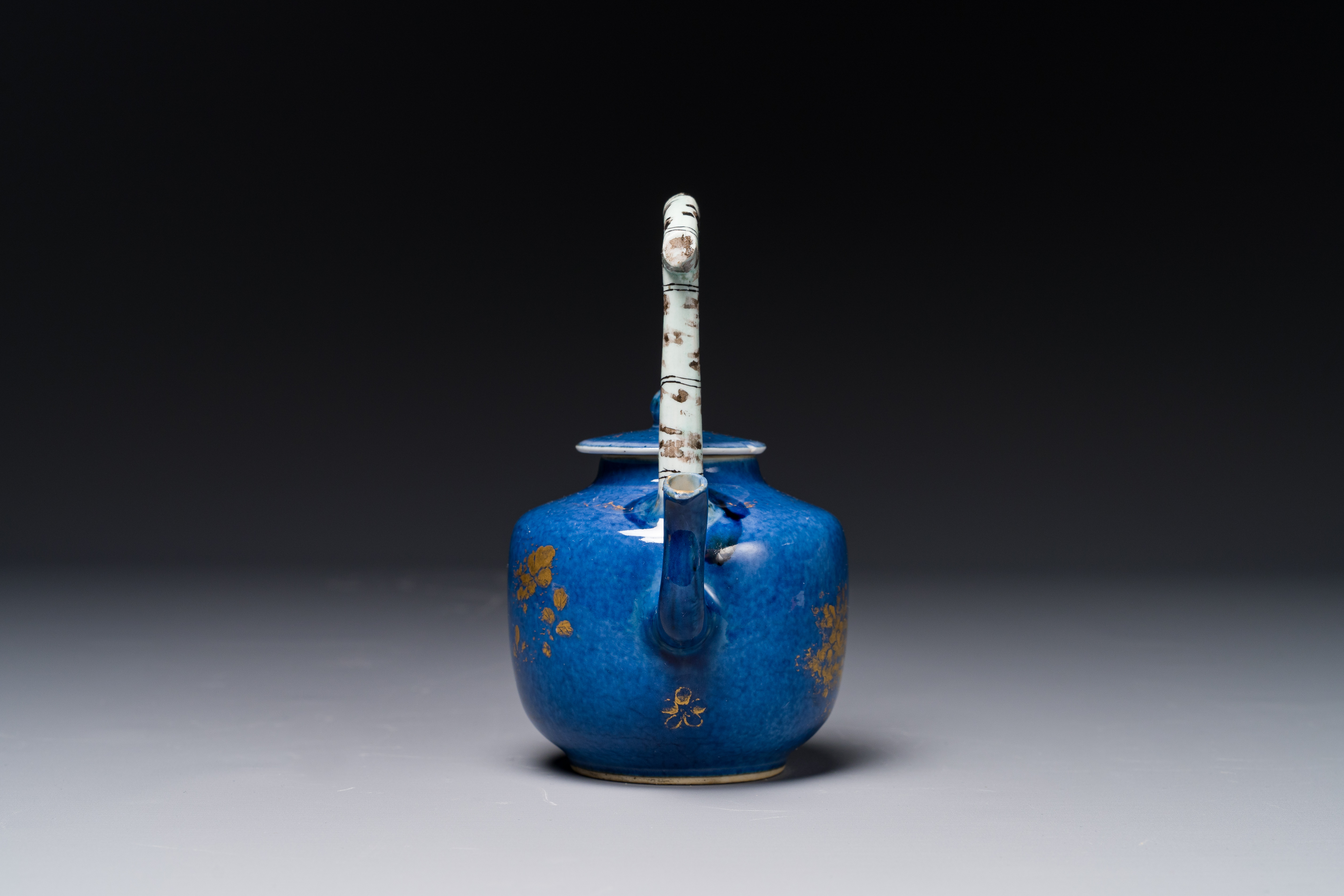 A Chinese gilt-decorated powder-blue teapot and cover with a faux-bamboo handle, Kangxi - Image 4 of 5