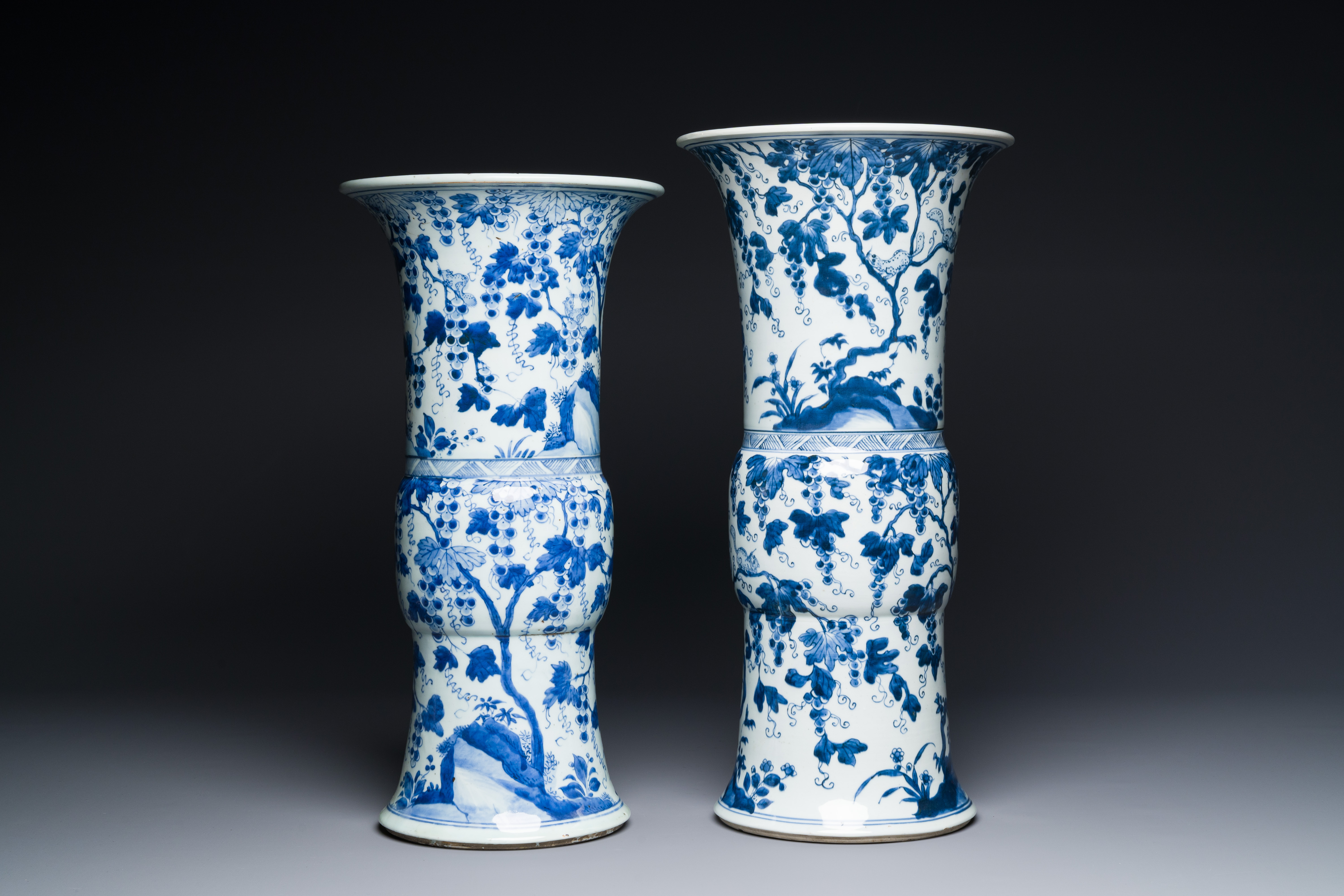 Two Chinese blue and white 'gu' vases with squirrels among grape vines, Kangxi - Image 5 of 7