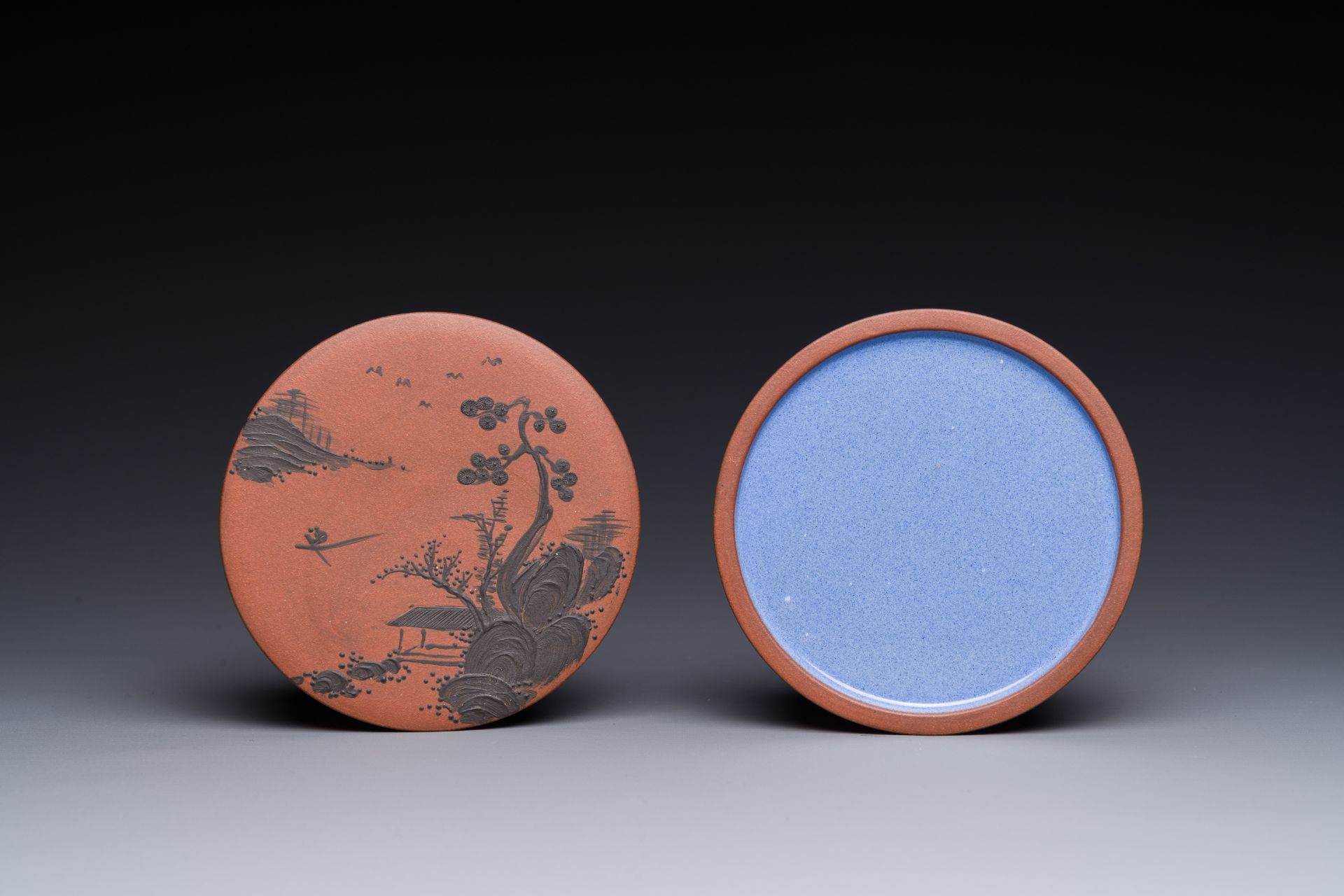 A Chinese blue-enameled Yixing stoneware box and cover with a mountainous landscape, 18/19th C. - Image 5 of 5