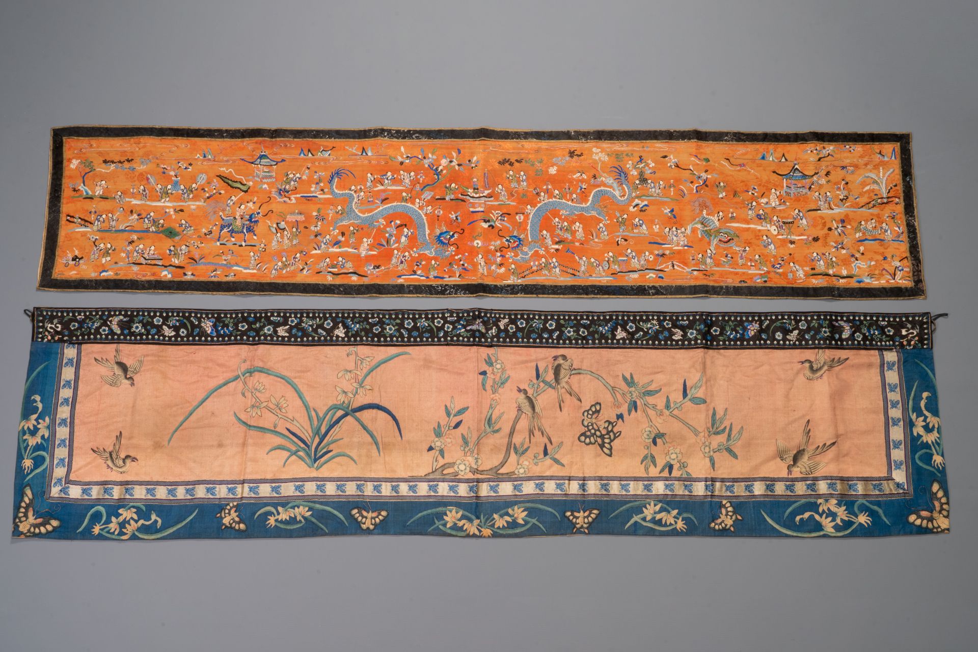 Two Chinese embroidered silk cloths with 'hundred boys' and 'birds and flowers' design, 19th C.