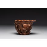 A Chinese carved bamboo 'lotus' libation cup, 17/18th C.