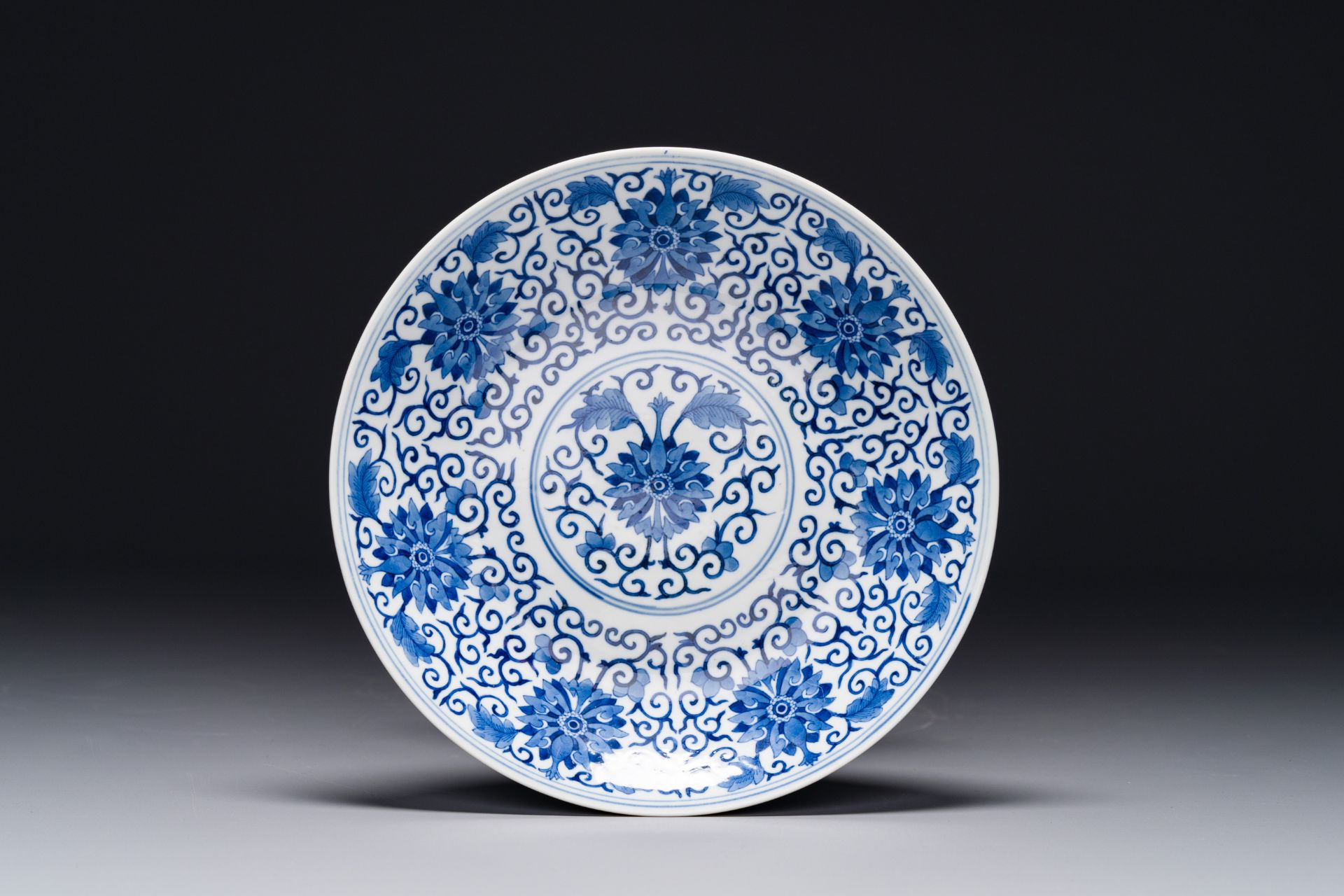 A Chinese blue and white 'lotus scroll' dish, Guangxu mark and of the period