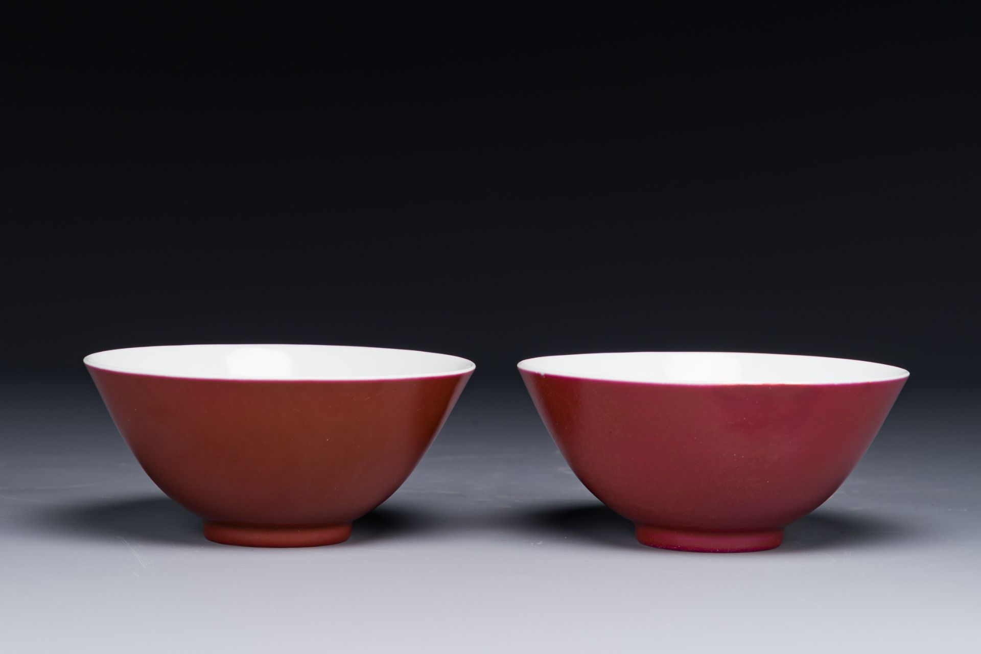 A pair of Chinese monochrome ruby-glazed bowls, Guangxu mark and of the period