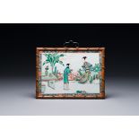 A Chinese rectangular famille verte plaque in wooden faux bamboo frame, Kangxi