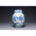 A Chinese blue and white jar and cover with birds and flowers, Transitional period