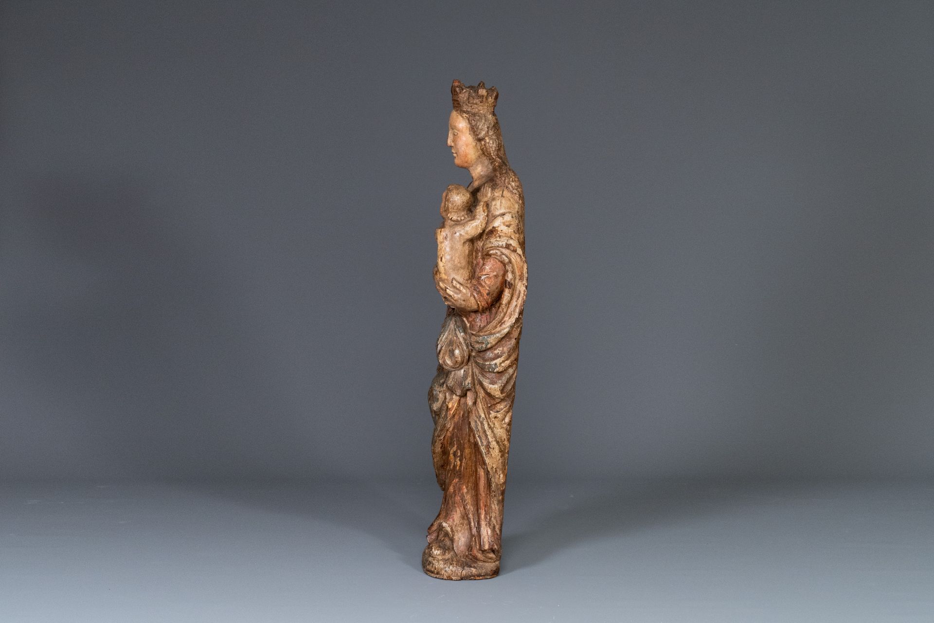 A polychromed carved oak figure of a Madonna and Child, France, 2nd half of 16th C. - Image 2 of 16