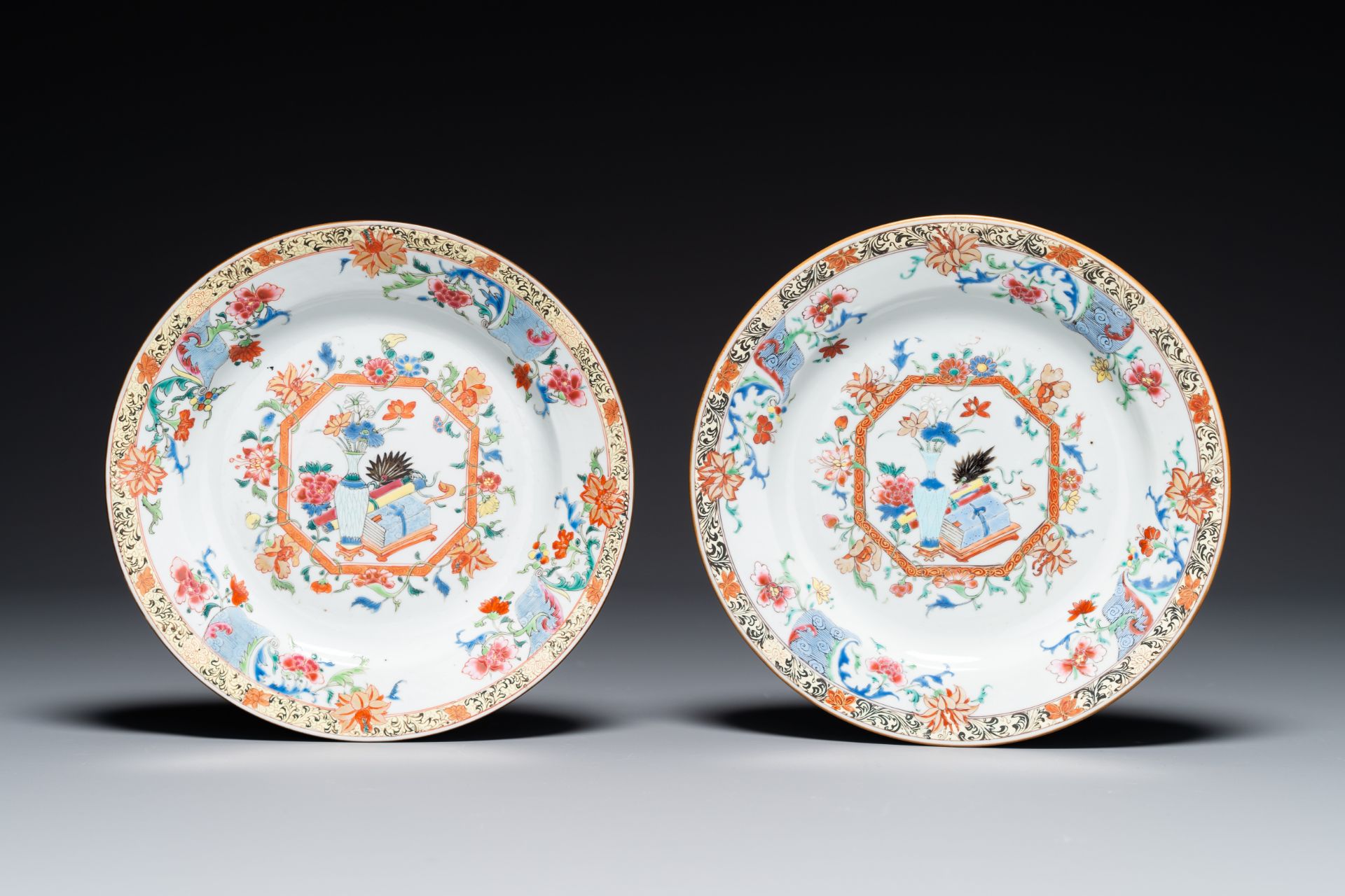 A pair of Chinese famille rose 'antiquities' dishes, Yongzheng